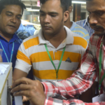 Officials open the voting box