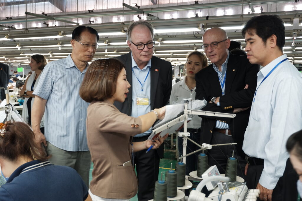 Scaling the Better Work model crucial for lasting improvements, tripartite delegation says.